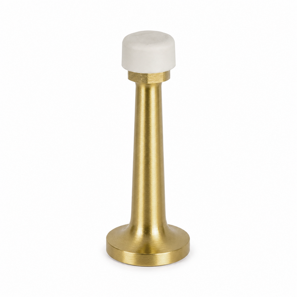 Gold door stopper with a white rubber bumper on a white background